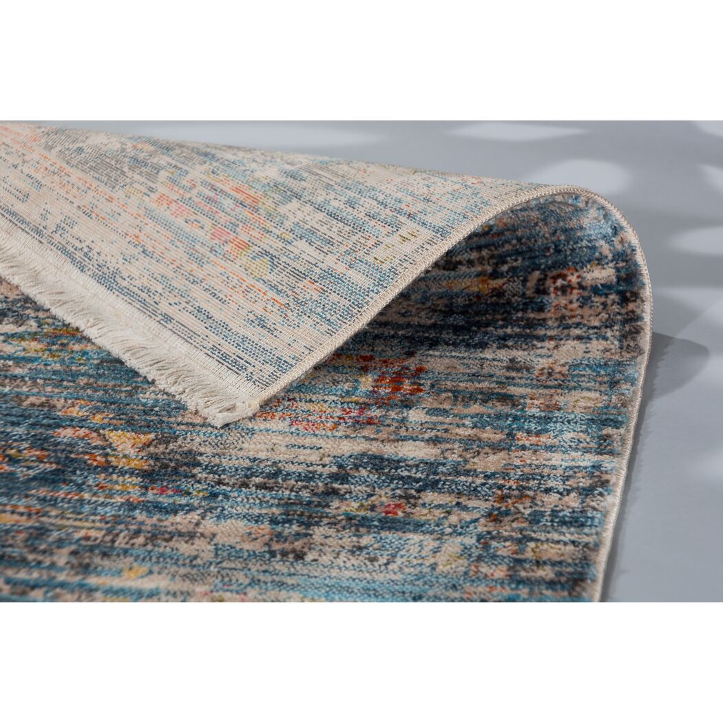 Blauer Teppich mit Fransen