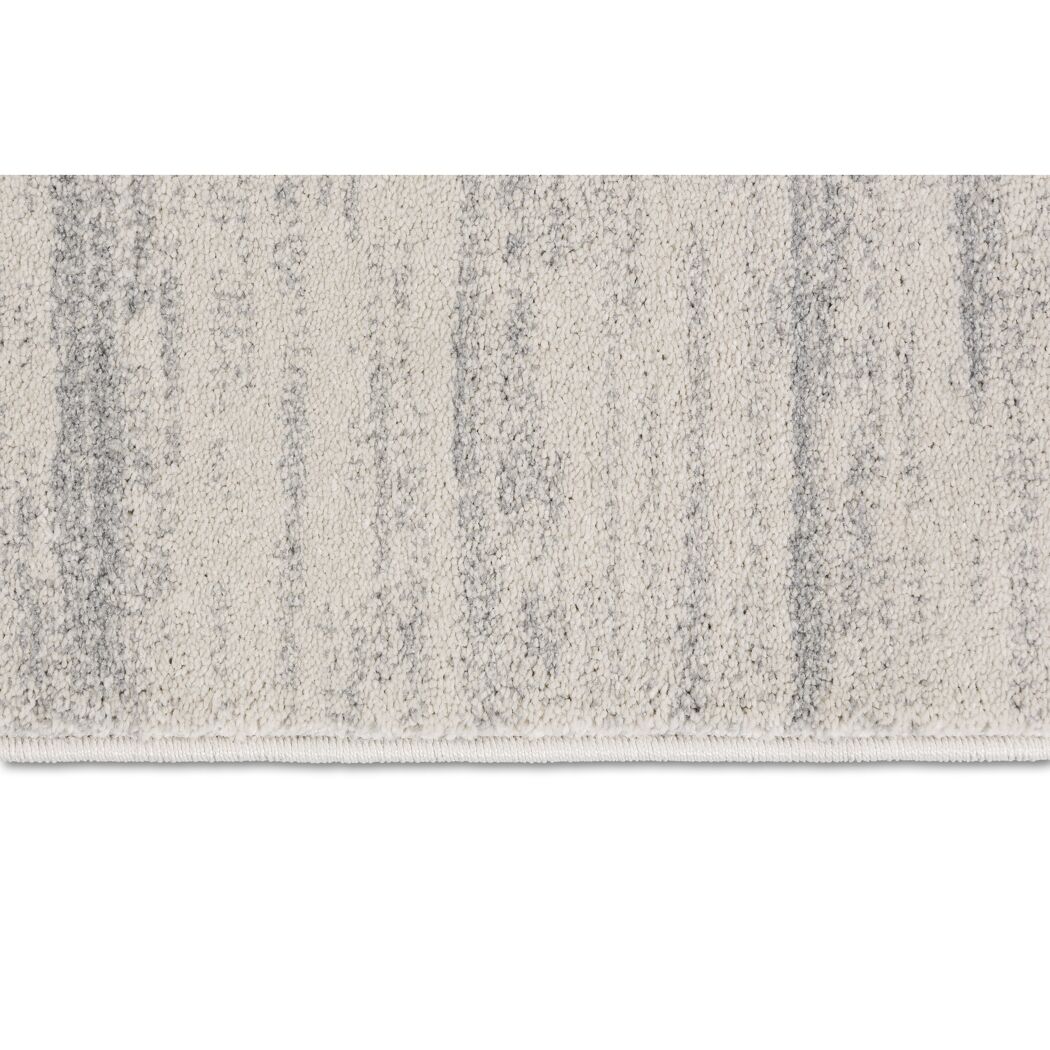 Beiger Teppich mit grauem Muster