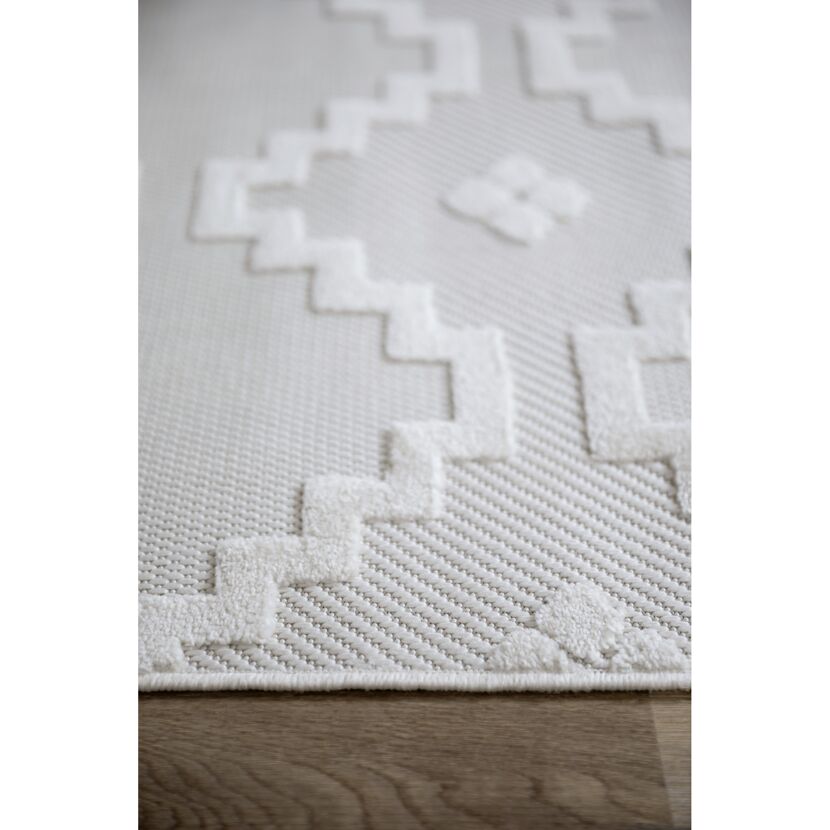 Beiger Teppich mit Muster
