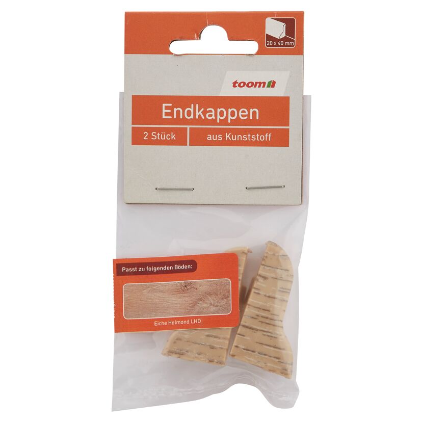 Zwei Endkappen aus Kunststoff in einer Verpackung