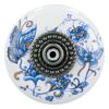 Runder Möbelknopf mit blau-goldenen Schmetterlingen und Blumen