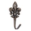 Altmessingfarbiger Wandhaken in Lilienform.