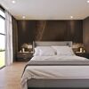 Modernes Schlafzimmer mit Holzwand