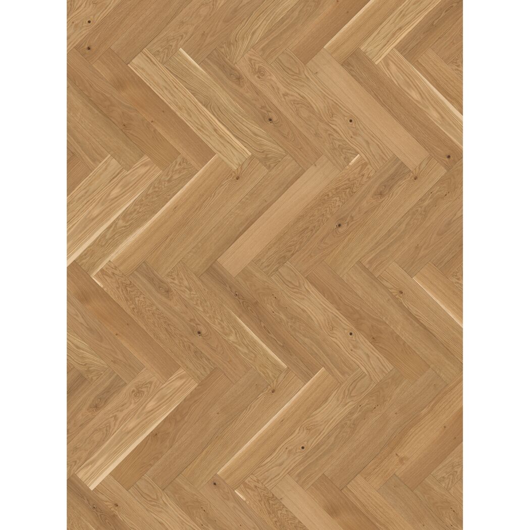 Heller Holzfußboden im Fischgrätmuster