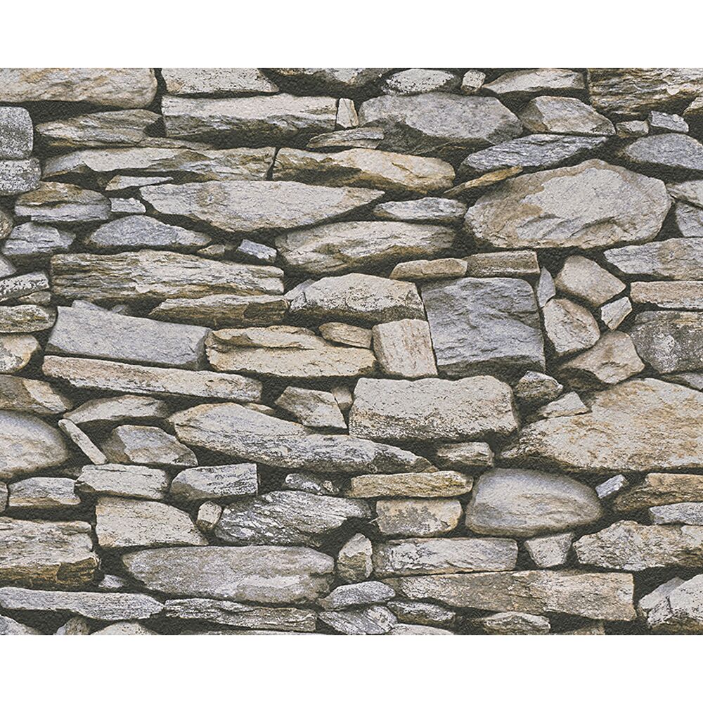 Eine Wand aus grauen und beigen Steinen.
