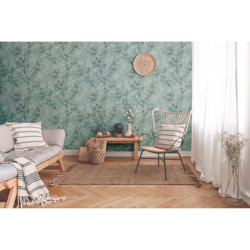 Wohnzimmer mit türkiser Blumentapete