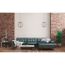 Wohnzimmer mit Ledersofa und Ziegelwand