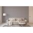 Modernes Wohnzimmer mit grauem Sofa, Teppich und Stehlampe.