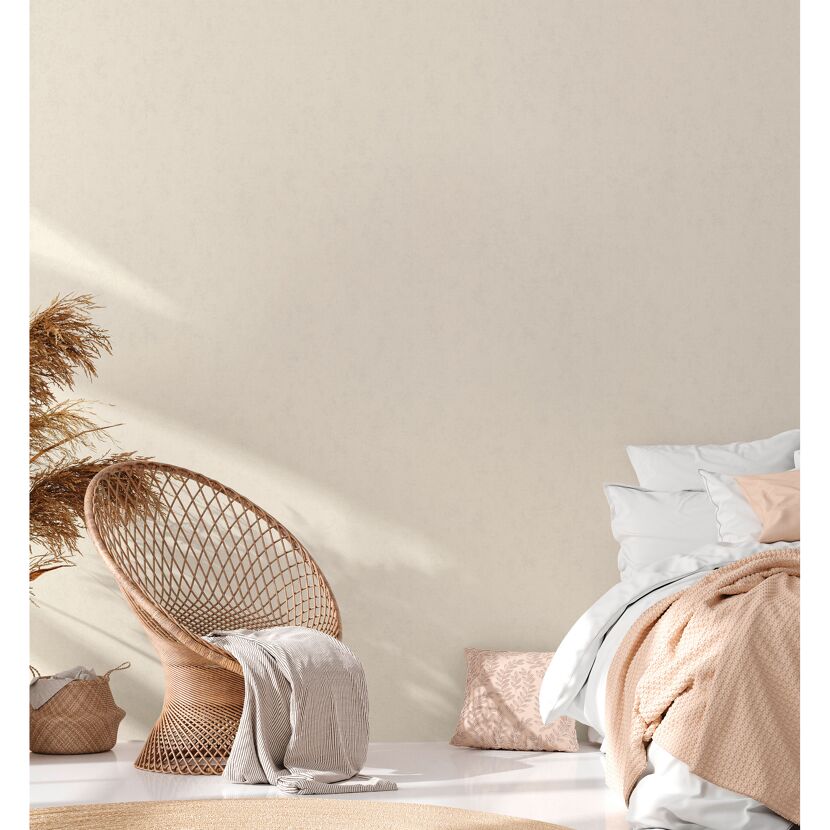 Schlafzimmer mit Korbsessel, Pampasgras und Bett