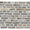 Graue und beige Ziegelwand