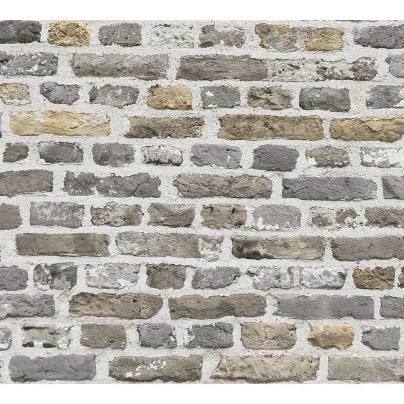 Graue und beige Ziegelwand