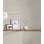 Beige Vliestapete "Pint Walls Uni Leinen" an der Wand
