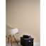 Beige Vliestapete "Pint Walls Uni Leinen" an der Wand