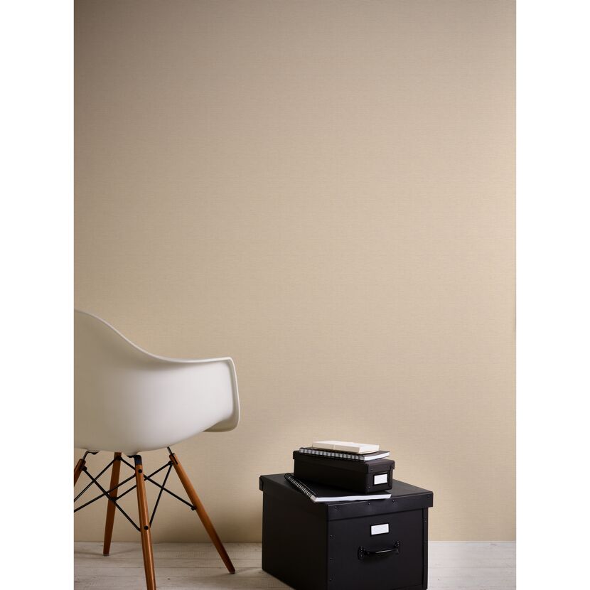 Beige Vliestapete "Pint Walls Uni Leinen" an der Wand