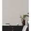 Vliestapete The BoS Uni in Beige an der Wand