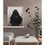 Person mit Rucksack auf Foto an der Wand mit Vliestapete Hygge 2