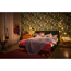 Schlafzimmer mit tropischer Tapete