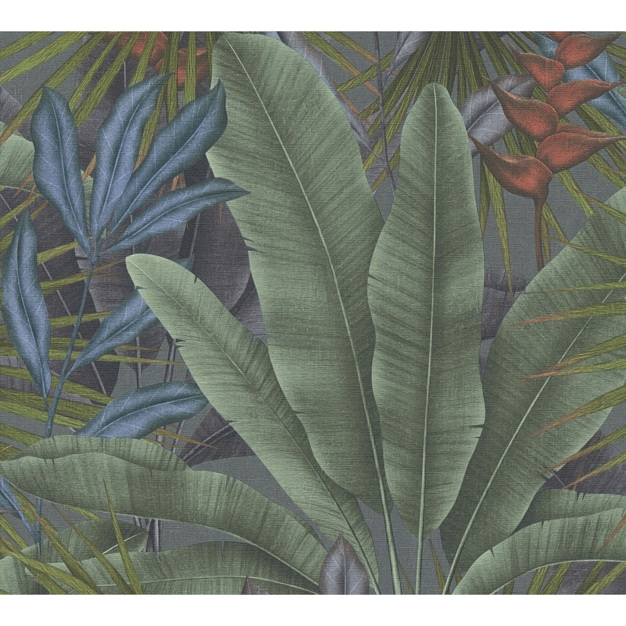 Tropische Blätter auf grauem Hintergrund