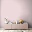 Rosa Sideboard mit Dekoelementen