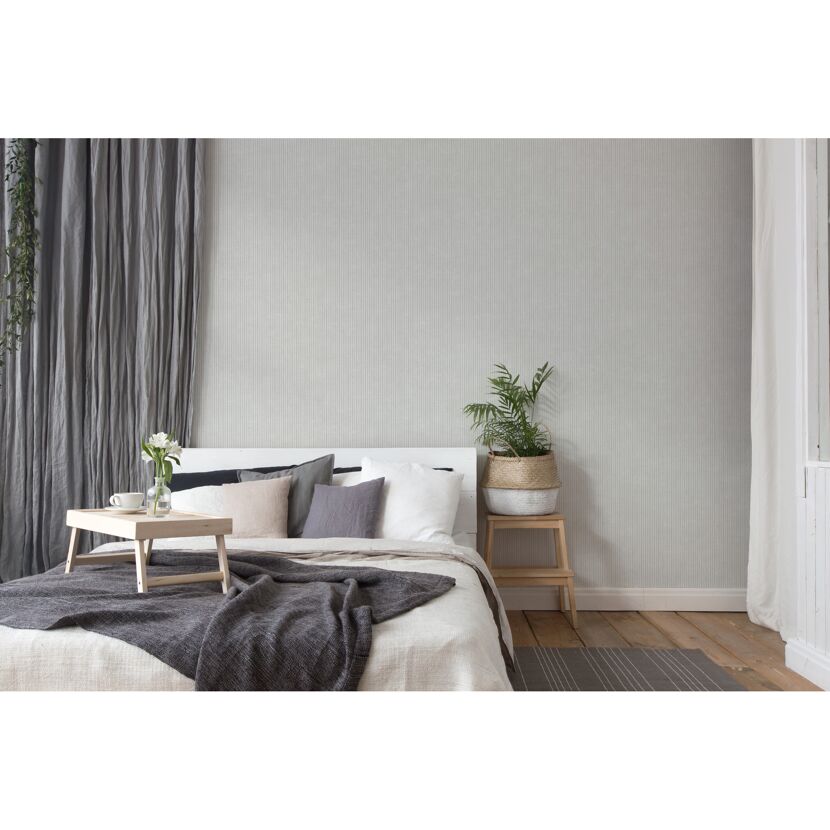 Gemütliches Schlafzimmer mit Bett