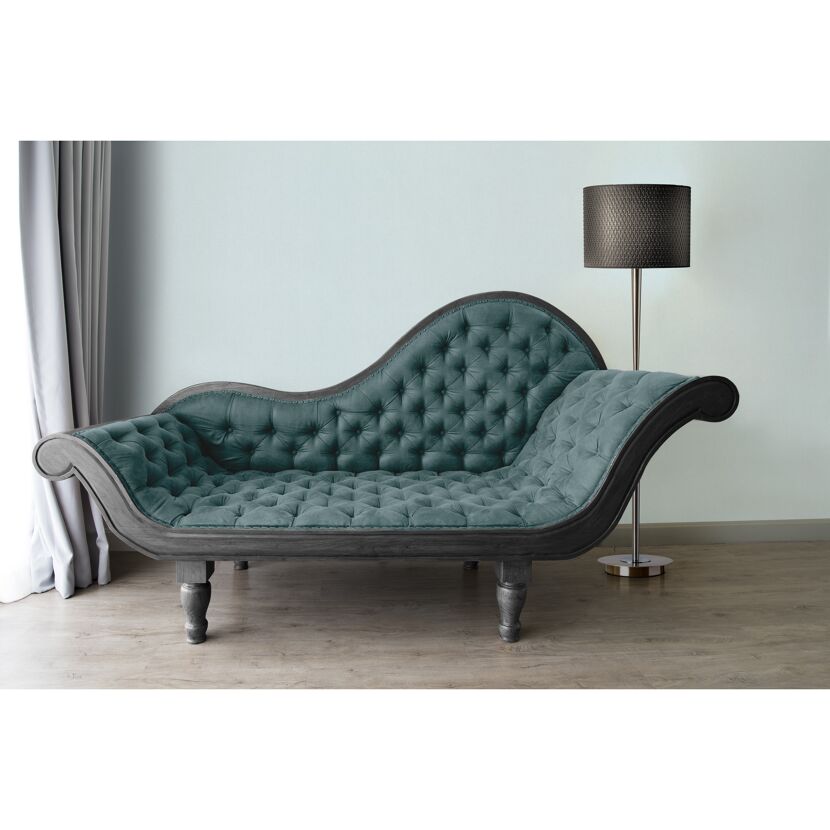 Gepolsterte Chaiselongue und Stehlampe