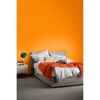 Schlafzimmer mit oranger Wand