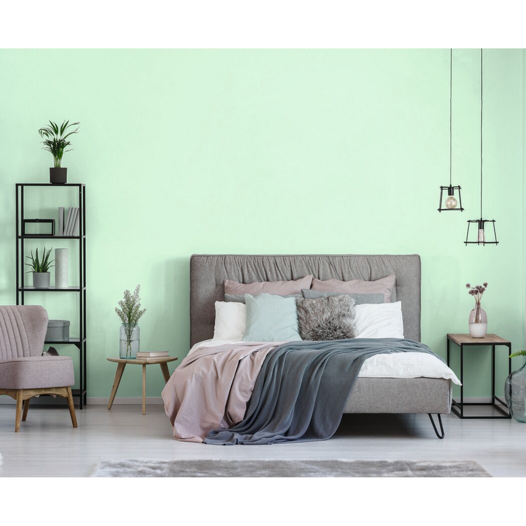 Schlafzimmer mit mintgrüner Wandfarbe