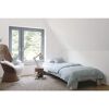 Kinderzimmer mit Bett und Sessel