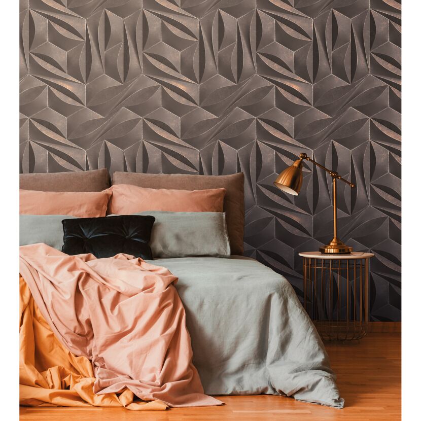 Bett vor strukturierter Wand