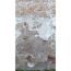 Abblätternder Putz auf Backsteinmauer