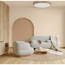 Wohnzimmer mit Sofa, Sessel und kleinem Tisch