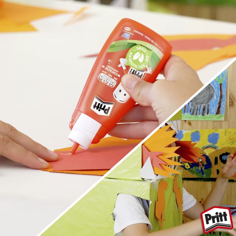 Person klebt Papier mit Pritt Alleskleber.