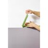 Person klebt Frogtape ab