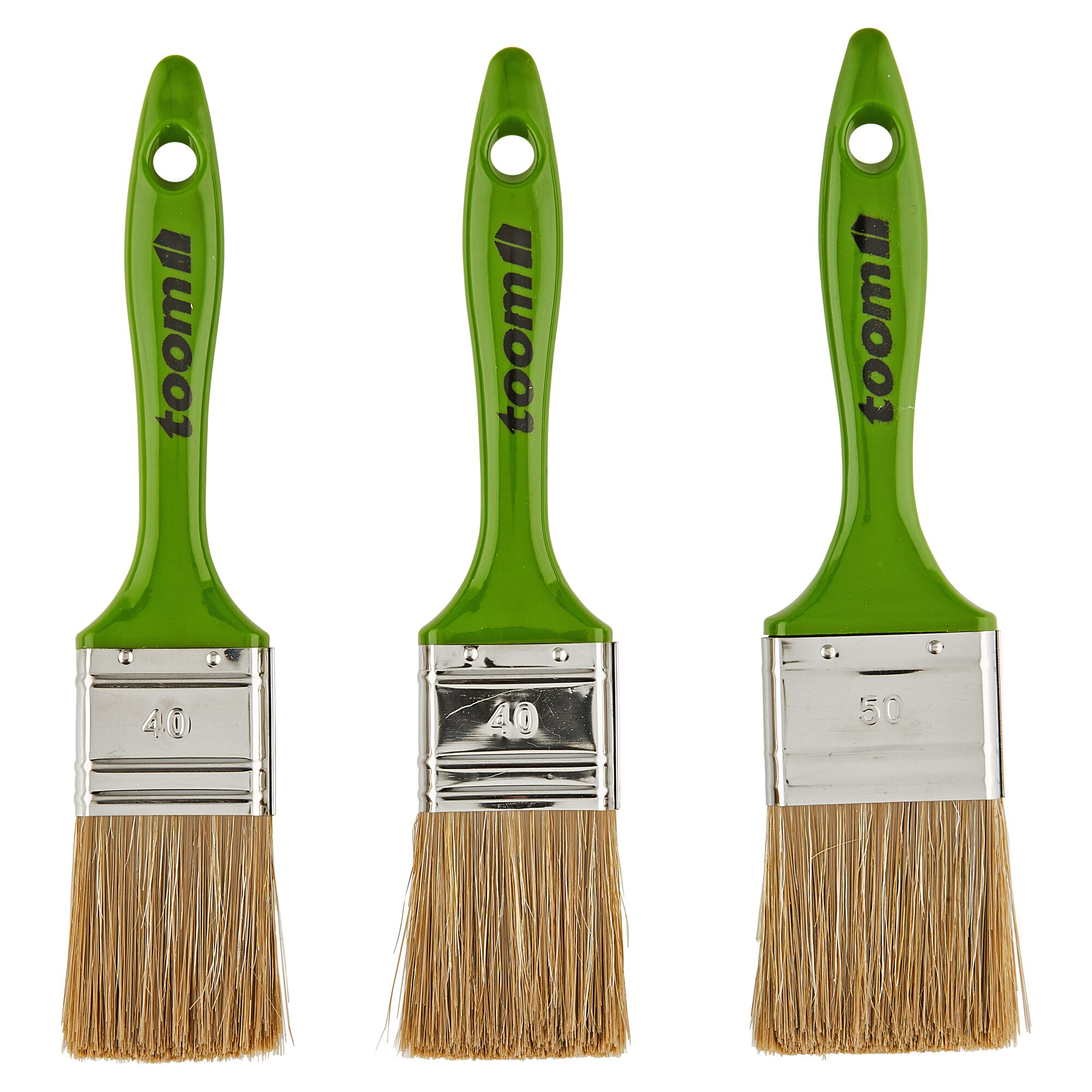 Drei Flachpinsel von toom mit grünen Griffen