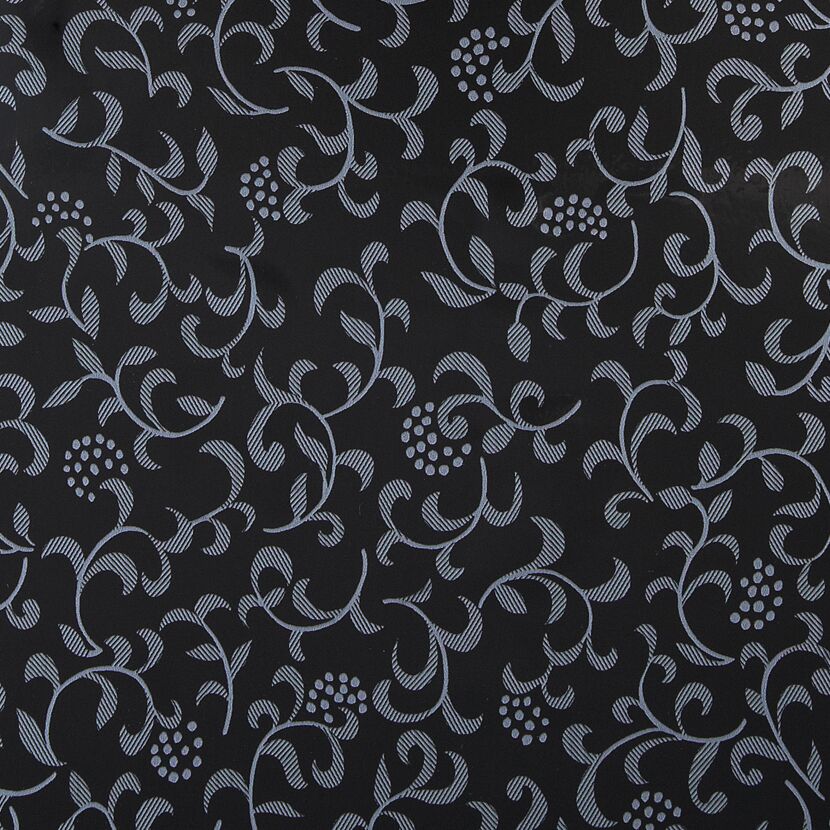 Schwarze Klebefolie mit silber-grauem Blätterrankenmuster
