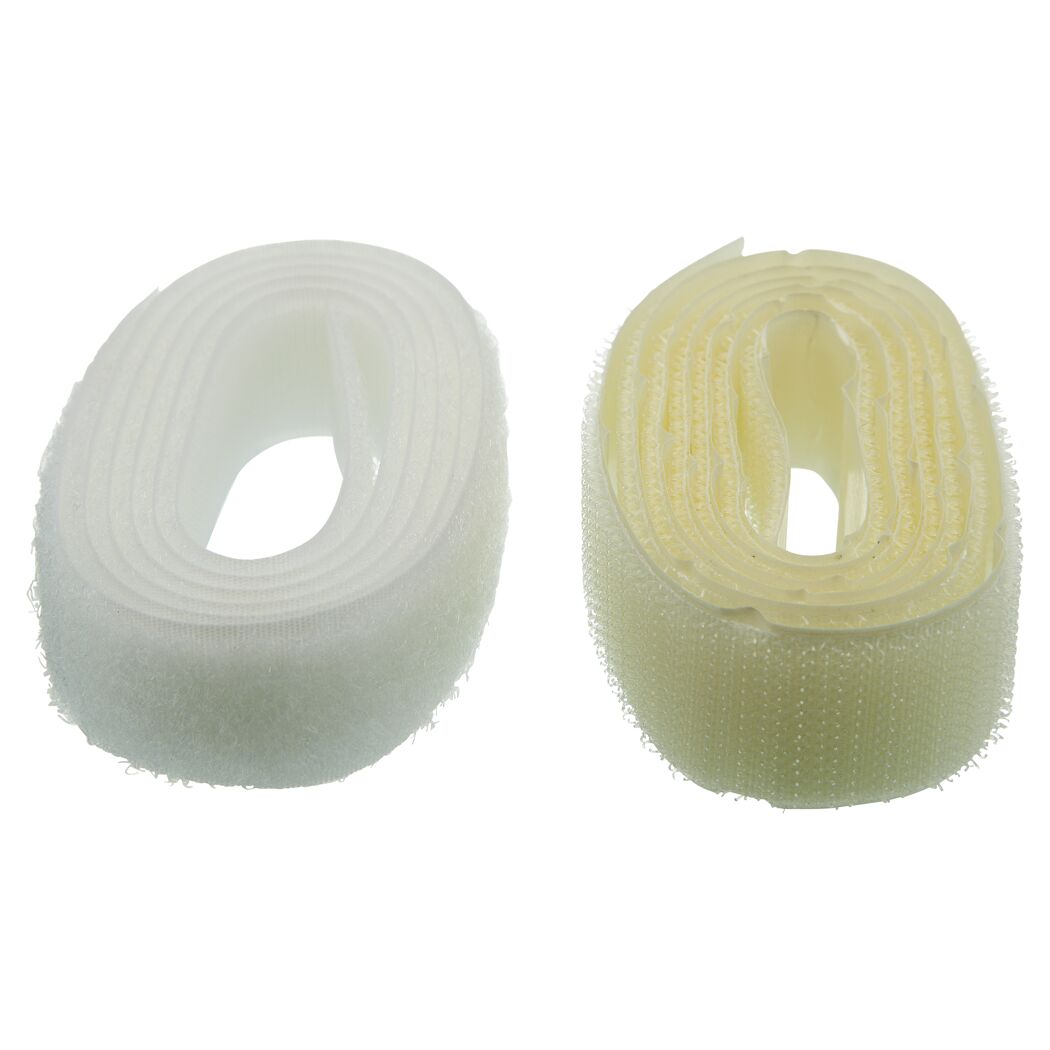 Zwei Rollen Klettband, eine weiß und eine beige