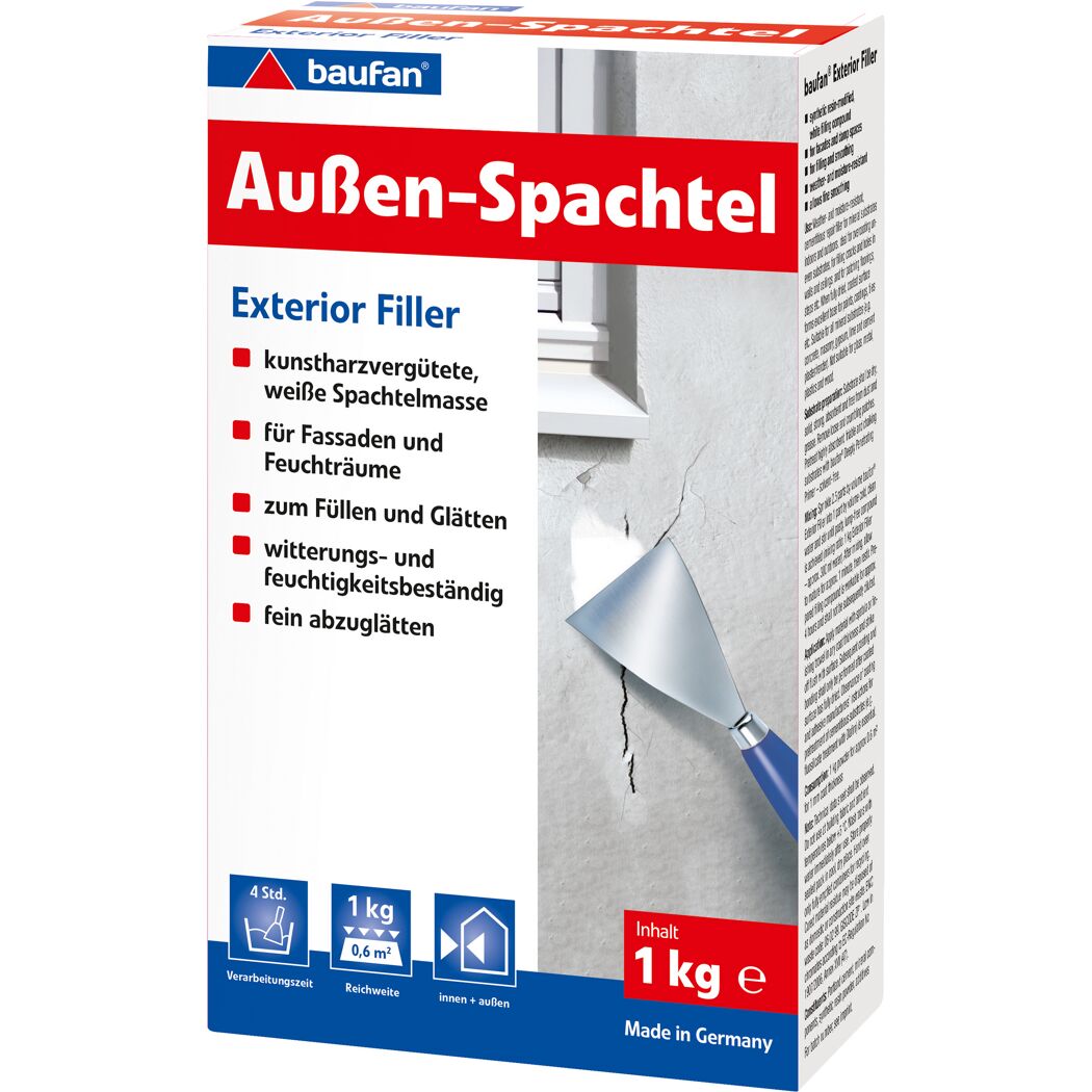 Person verwendet Spachtelmasse, um einen Riss an einer Wand zu füllen.