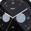 Schwarze Funkuhr mit integriertem Thermometer und Hygrometer