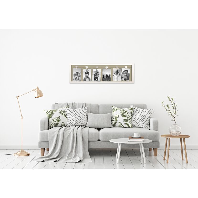 Mehrfach-Bilderrahmen mit Familienfotos an der Wand