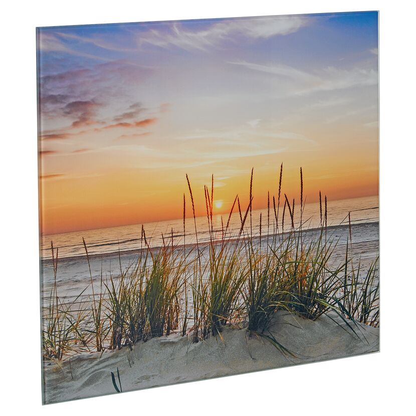 Strandhafer im Sand bei Sonnenuntergang