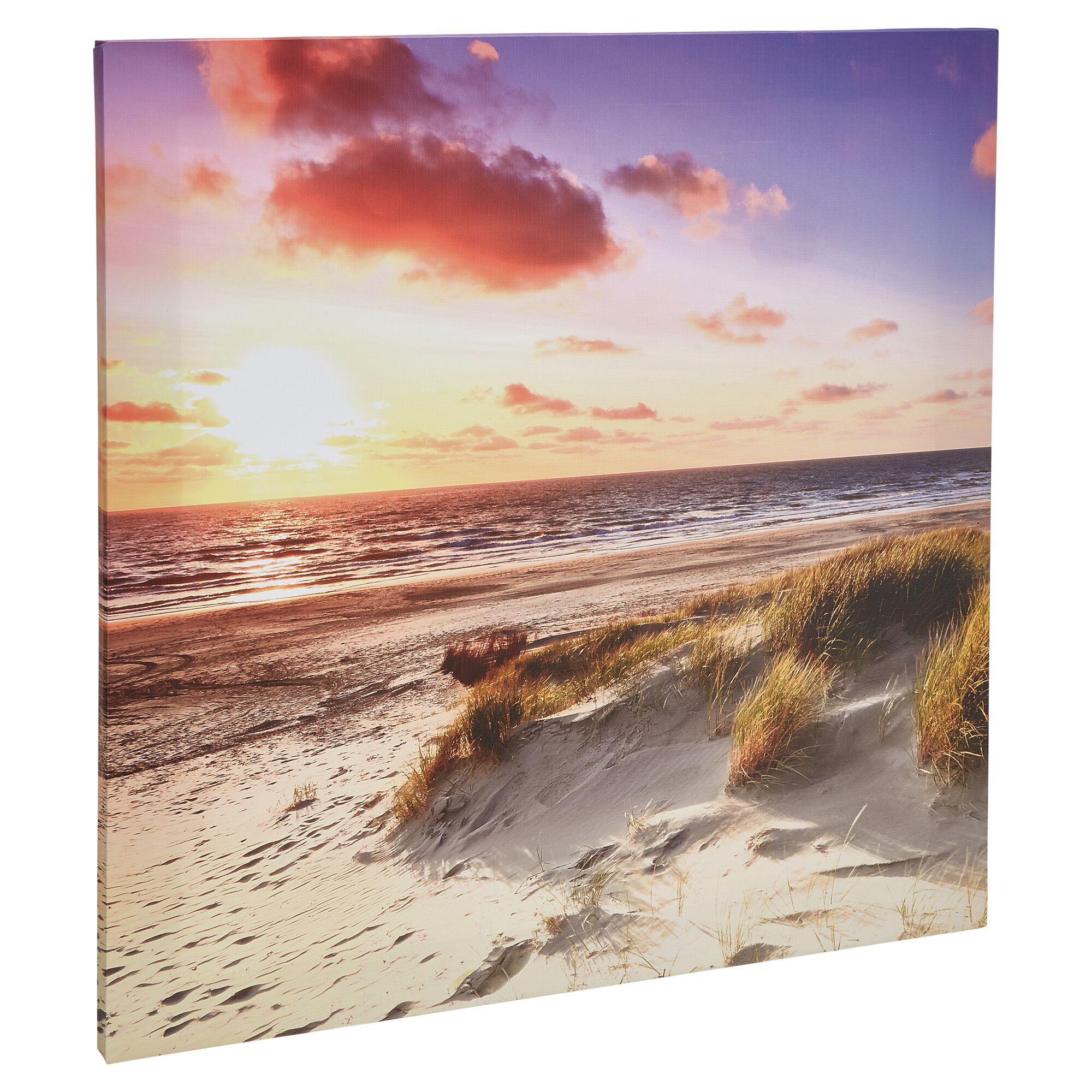 Sonnenuntergang am Strand mit Dünengras