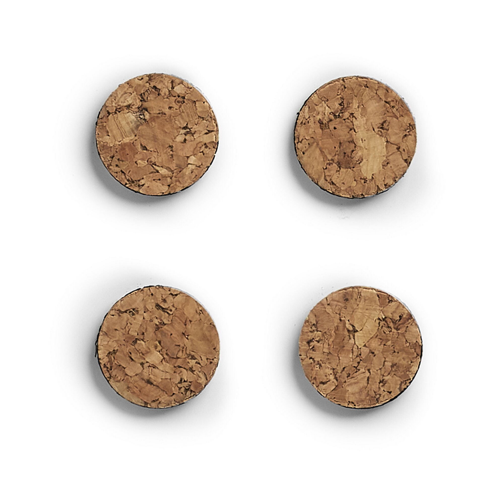 Vier runde Korkuntersetzer