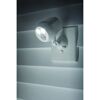 Weißer Mr. Beams Strahler an Hauswand montiert