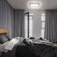 Modernes Schlafzimmer mit geöffneter Balkontür