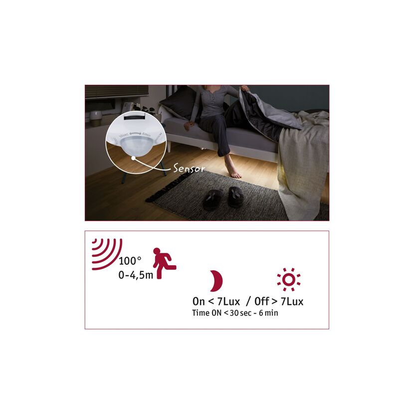 Person steht neben Bett, unter dem ein LED-Sensor angebracht ist.