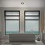 Badezimmer mit Badewanne und Meerblick