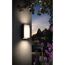 Schwarze LED-Wandleuchte Turaco an Hauswand