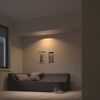 LED-Einbauspot 'Hue Milliskin' beleuchtet gemütlichen Wohnraum.