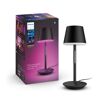 Schwarze Philips Hue Bloom Tischleuchte mit Verpackung.
