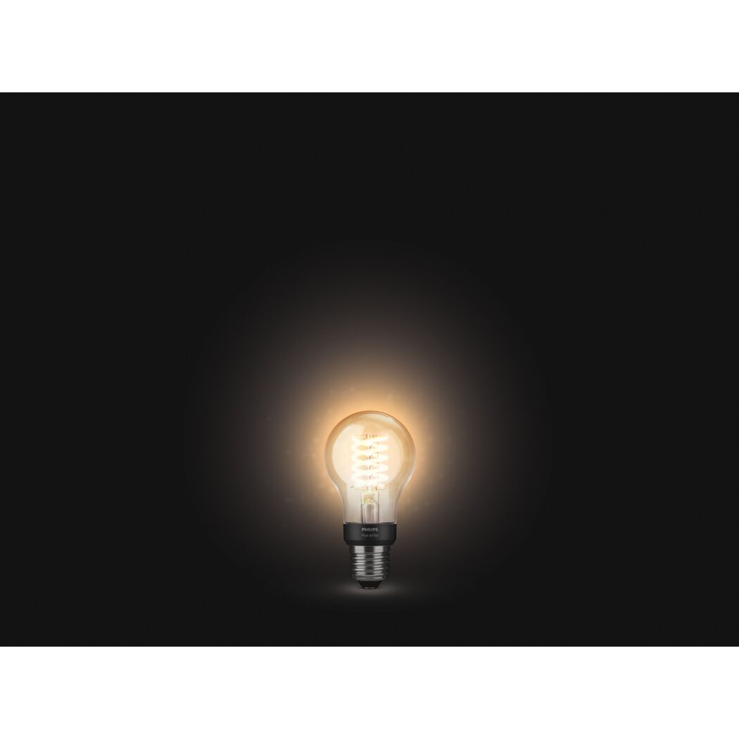 Glühendes LED-Leuchtmittel 'Hue White' Tropfen gold E27.